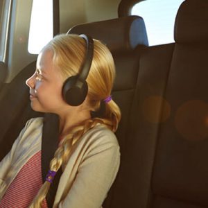 Child In Car With Headphones