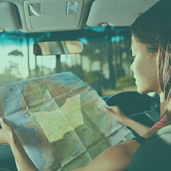 Driver Views Map To Navigate