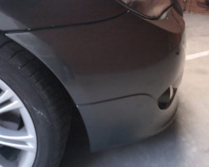 Black Car Bumper After Cosmetic Repair