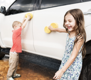 Children Playing While Washing Car